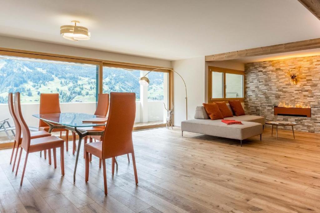 Апартаменты Eiger Panoramica - Aare Jungfrau Ag Гриндельвальд Экстерьер фото
